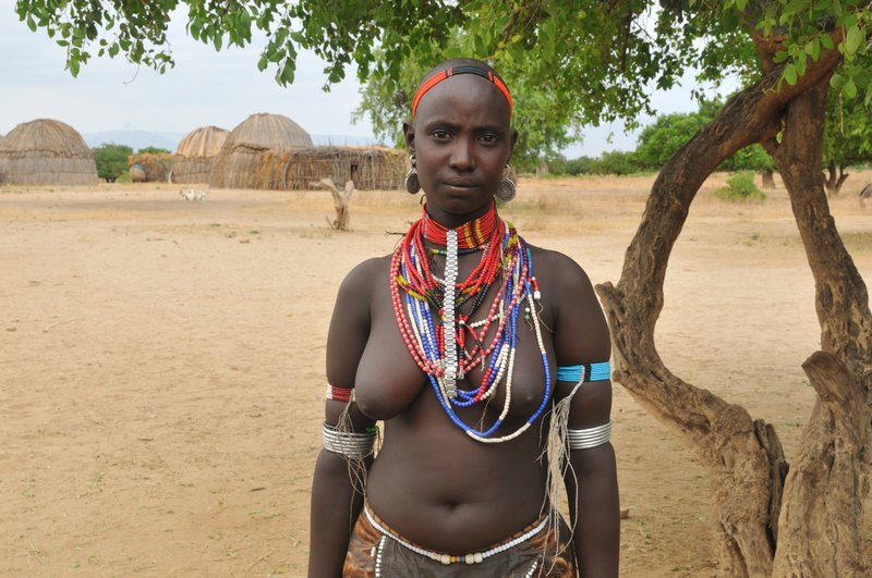Arbore woman outside of her village - Omo Valley, Ethiopia