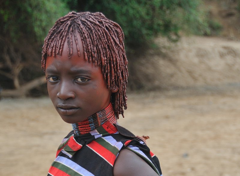 "A forlorn teenager with doleful eyes" - Hamer initiation ceremony - Turmi, Omo Valley, Ethiopia
