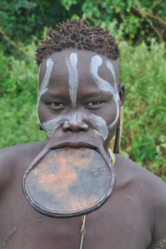 Mursi woman with large lip plate - Mago National Park, Omo Valley, Ethiopia