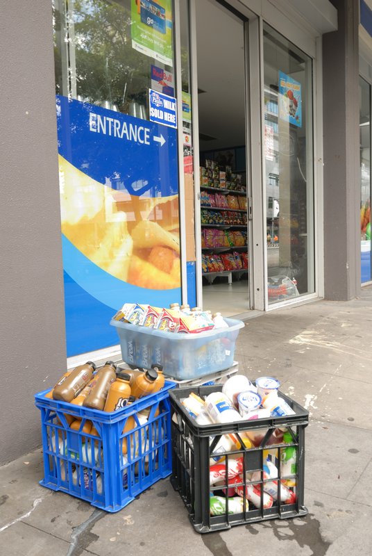 Ruined produce being disposed by a Southbank business - 15 Jan - Southbank, Australia