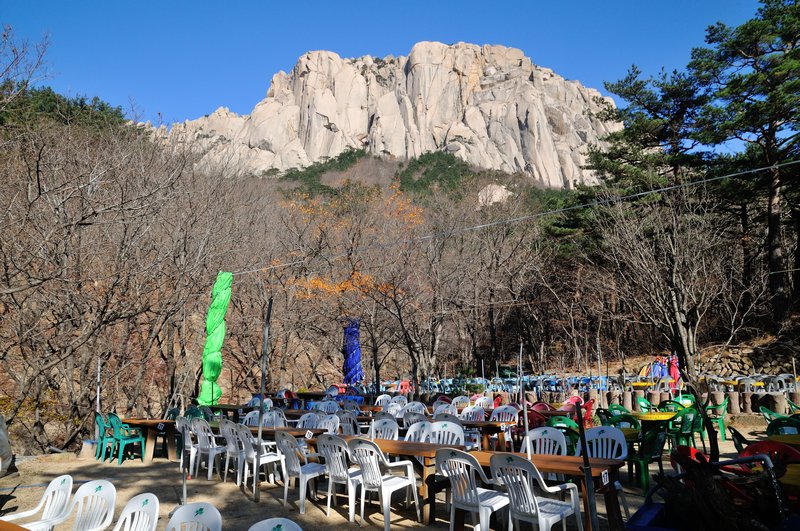 Ulsanbawi Rock looms over an empty eating area - Seoraksan National Park, South Korea