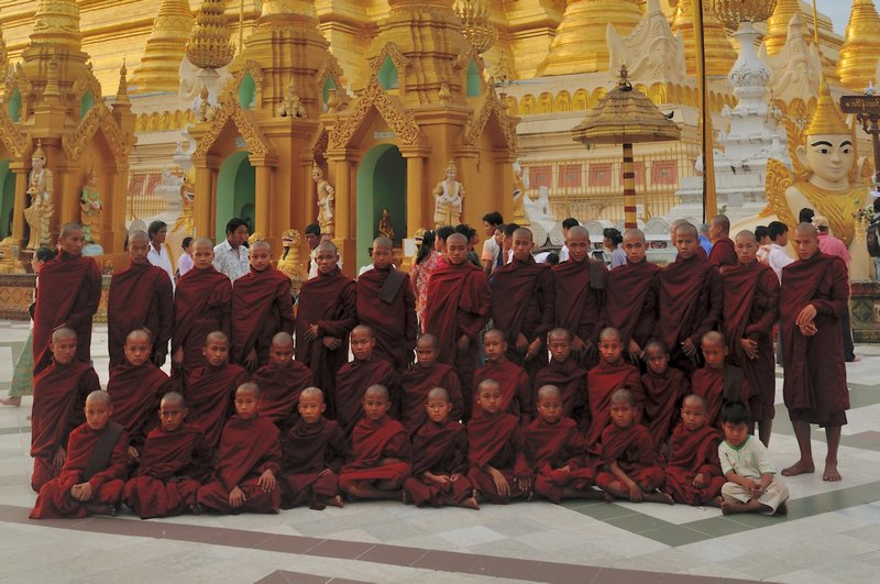 Monks pose for a photograph - Shwedagon Paya, Yangon, Myanmar
