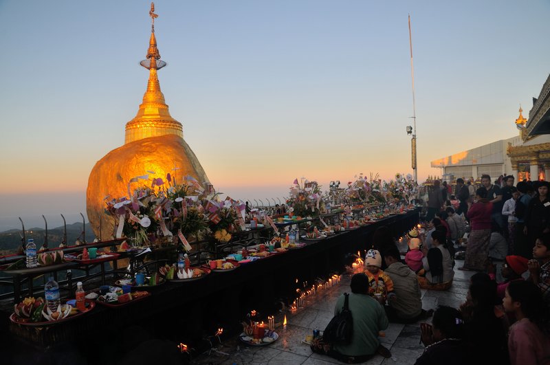 Dawn prayers at Golden Rock - Mount Kyaiktiyo, Myanmar