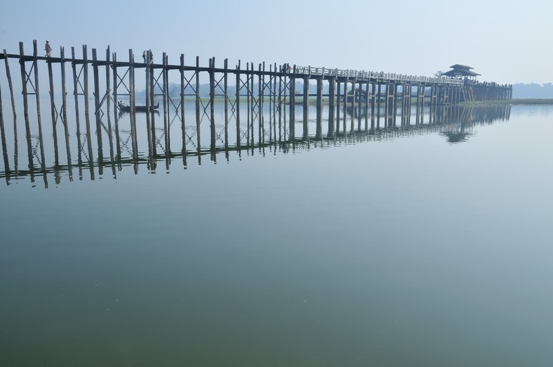 U Bein’s bridge sits above Taungthaman Lake - Amarapura, Myanmar