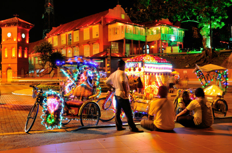 Colourful trishaws awaiting customers - Melaka, Malaysia