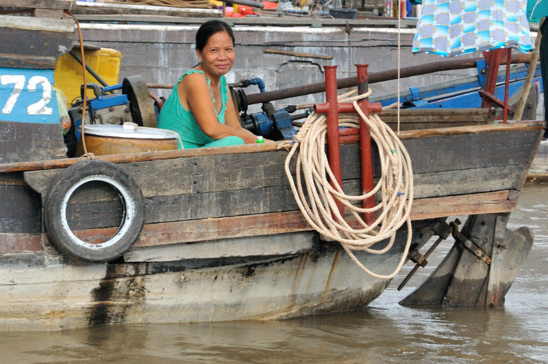 Smiles from a boat - Floating Market, Can Tho, Vietnam