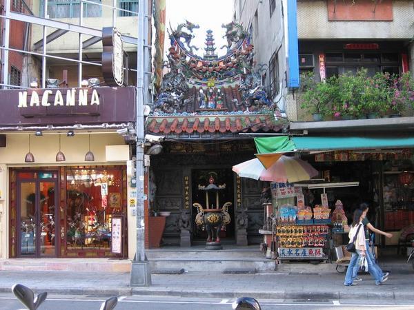 Small temple nestled in a busy street - Danshui