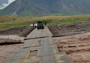 Third river crossing on a very unstable bridget - near Zigar, Tajikistan