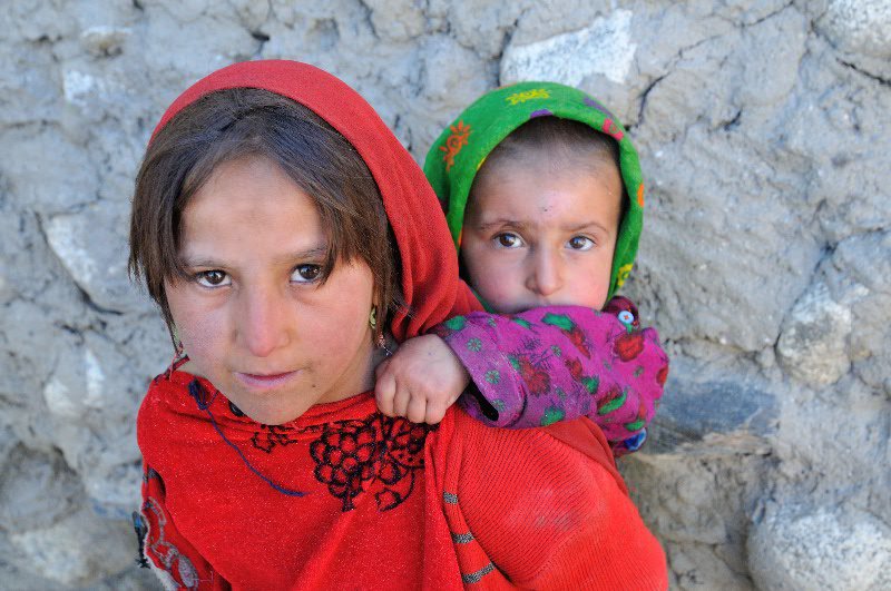 Young girl and sibling - Kizkut, Afghanistan