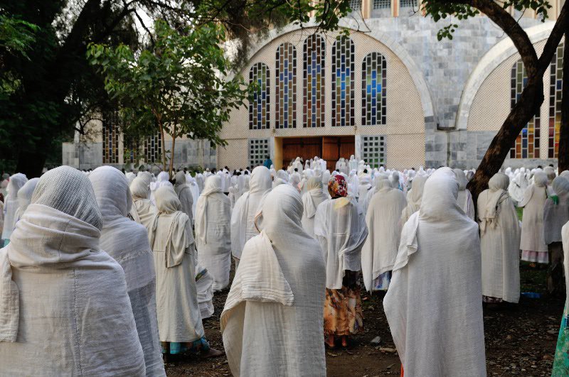 Congregation outside of St Mary's of Zion Church on St Mary's day - Axum, Ethiopia