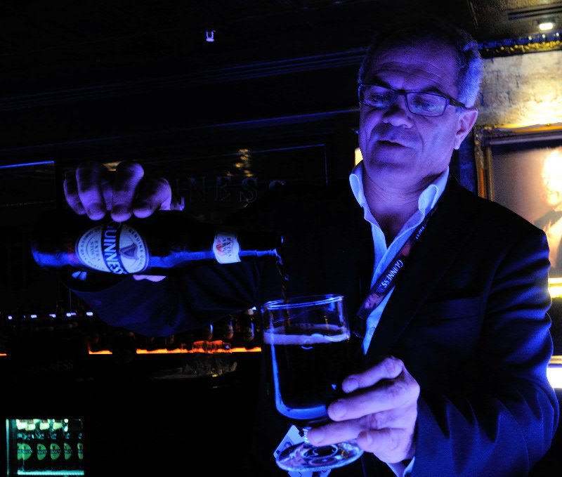 Pouring the perfect glass at the Guinness Connoisseur Experience - Guinness Storehouse - Dublin, Ireland