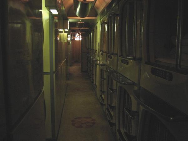 Dim interior of a capsule hotel