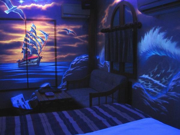 The room by black light...