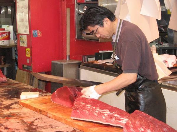 Preparing tuna for sale - Tsukiji Fish Market