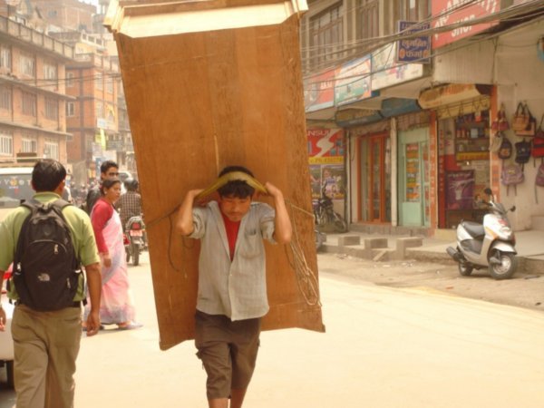 Home removals Nepal - these tough people will literally carry anything on their heads