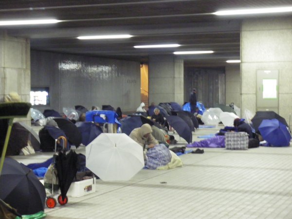 homeless ppl underneath tokyo metropolitan