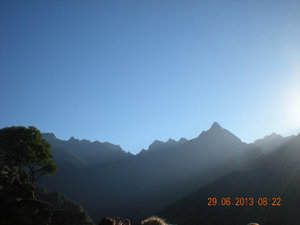 Sunrise over the mountains on the way up to Machu Picchu