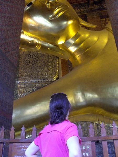 Amy Watching the Reclining Buddha at Wat Pho