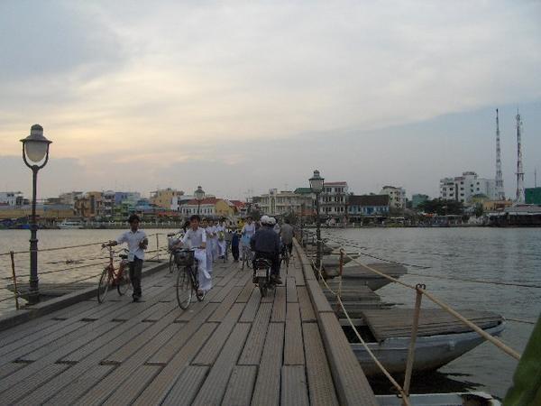 Walking Across the Floating Bridge in Ha Tien