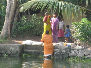 Family at shore of backwater