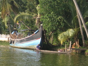 Long boat parked in backwaters waiting for big race in June