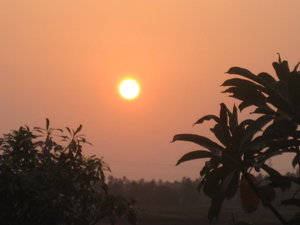 Sun setting over rice field before we go to sleep on houseboat