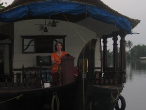 Margaret steering houseboat