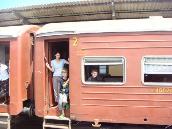 Family on the train - brief pause in Galle