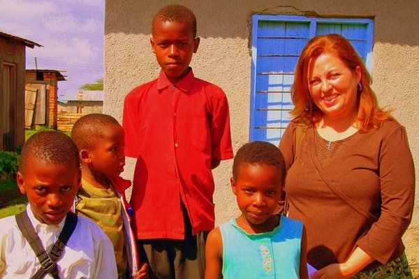 Janet and some local children