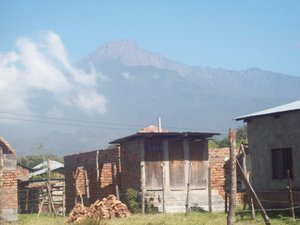 Mt. Meru taken from the church building. The neighborhood of Maji ya Chai.