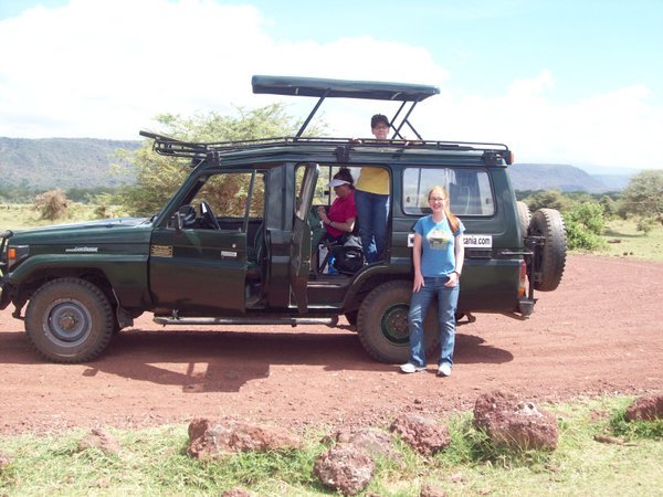 Pam, Debra and Hallie in front of the jeep