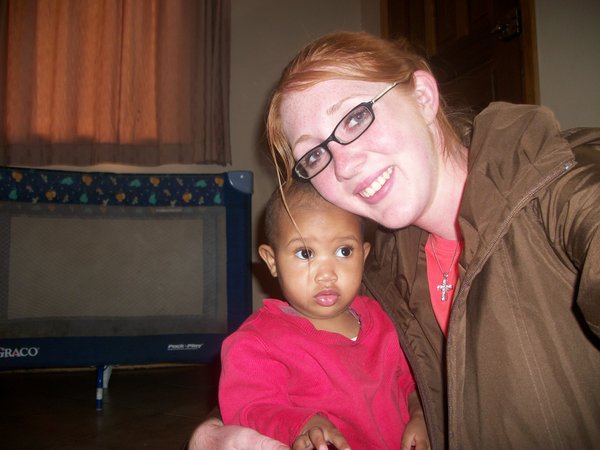 Hallie & a baby at the orphanage