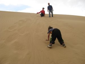 Playing in the sand dunes