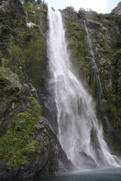 Waterfall Flowing into the Fjord