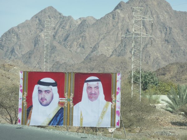 sheik billboards in desert
