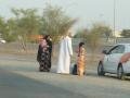 family on roadside