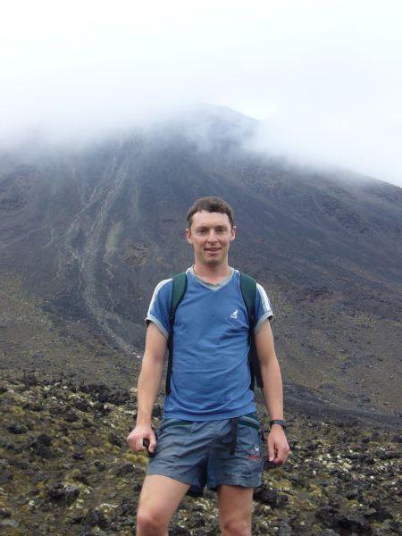 Paul with a cloud covered Mount Doom in the background
