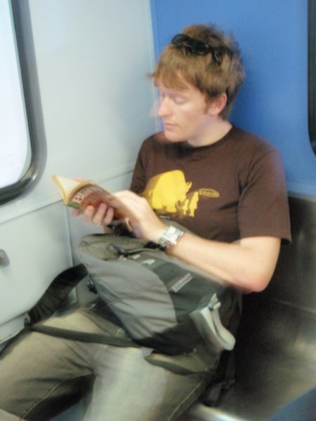 Aaron addicted to his book (we were on that train for two minutes- i was addicted)