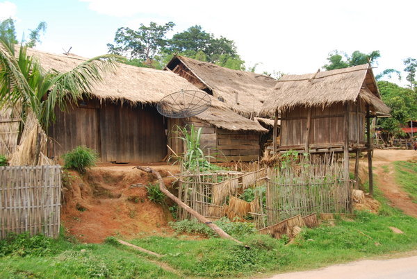 Typical Laos farmstead, complete with satellite TV!