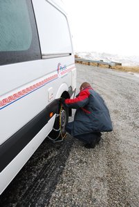 Dave fitting snow chains