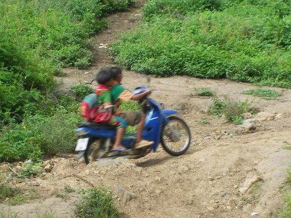 Kids riding motorbikes
