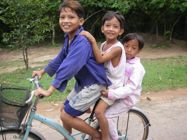 Three kids, one bike