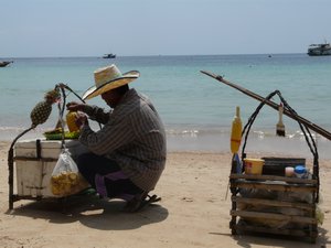 Beach Vendors Selling Pineapple