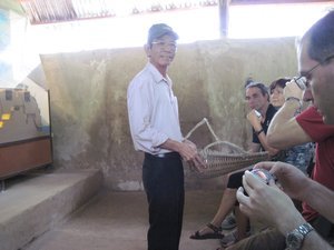 Tour guide for Chu Chi tunnels.  He is vietmanese but American and fought for the Americans during the war.