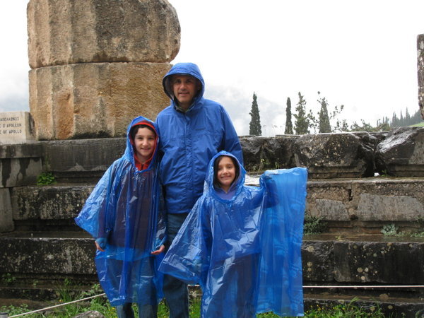 Three Blue Smurfs in the rain