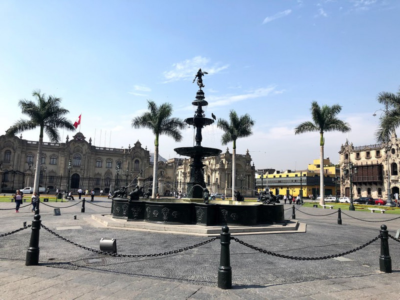 Palacio de Gobierno in the background of the main square - the official residence of the President of Peru