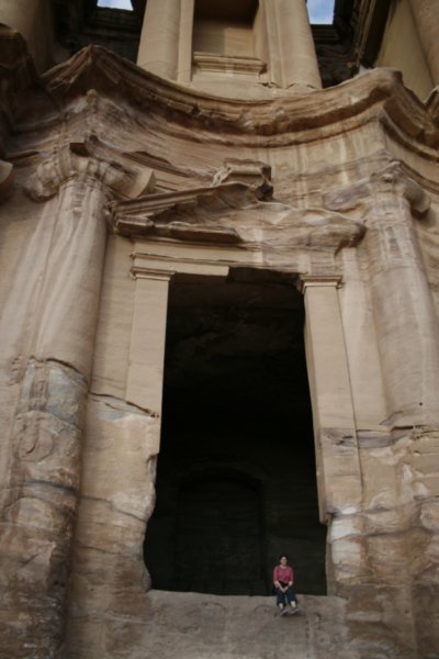 lisa in the doorway of the monestary in petra