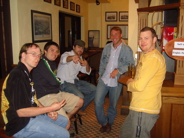 The boys hanging inside the pub....close to the tap!