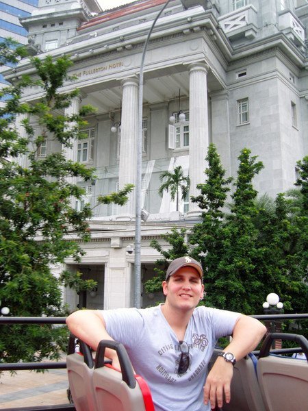 Riding on the Hippo Bus Tour with the Fullerton Hotel behind me