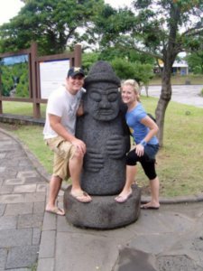 Us with the traditional statue of Jeju.
